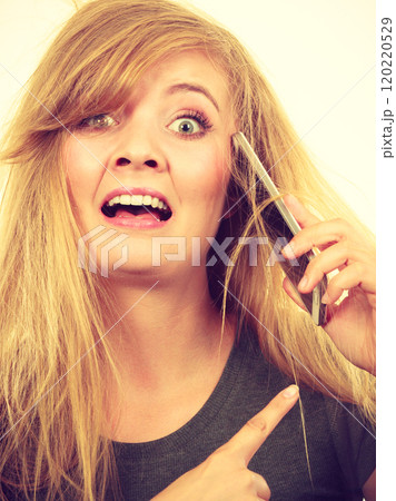 Crazy young woman talking on phone Crazy young woman talking on phone 120220529