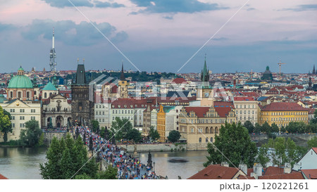 Scenic summer aerial view of the Old Town pier architecture and Charles Bridge over Vltava river timelapse in Praha. Prague, Czech Republic. 120221261