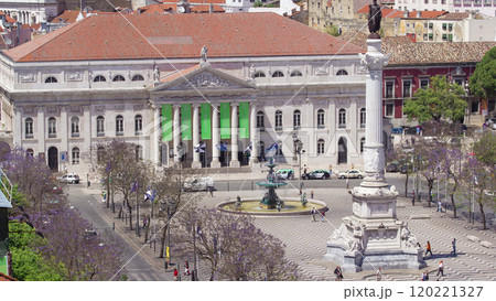 Rossio square in the central Lisbon with a monument of the king Pedro IV from Santa Justa Elevator. Portugal timelapse Rossio square in the central Lisbon with a monument of the king Pedro IV from Santa Justa Elevator. Portugal timelapse 120221327