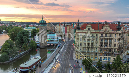 Sitkovska water-tower timelapse and traffic on road in old city center of Prague day to night. 120221379