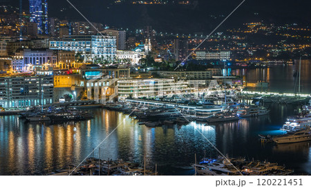 Panorama of Monte Carlo timelapse at night from the observation deck in the village of Monaco with Port Hercules. 120221451