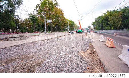 Road construction site with tram tracks repair and maintenance timelapse. Road construction site with tram tracks repair and maintenance timelapse. 120221771