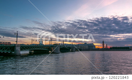 Traffic on the Palace bridge after sunset day to night timelapse Traffic on the Palace bridge after sunset day to night timelapse 120221843
