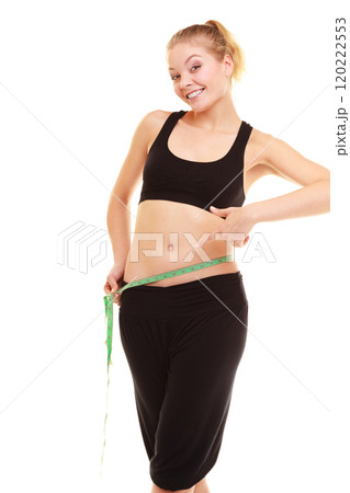 diet. slim blonde girl with measure tape measuring waist diet. slim blonde girl with measure tape measuring waist 120222553