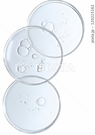 The texture of a cosmetic serum or body gel in a Petri dish. The texture of a cosmetic serum or body gel in a Petri dish. 120223162