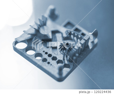 Object printed on 3D printer from metal powder using Metal Jet technology. High detailed detailing parts. Metal Jet. 3D-printed metal parts. Modern 3D printing, additive manufacturing technologies Object printed on 3D printer from metal powder using Metal Jet technology. High detailed detailing parts. Metal Jet. 3D-printed metal parts. Modern 3D printing, additive manufacturing technologies 120224436