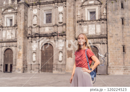 Female tourist in front of Catedral de Puebla, Mexico. Travel, cultural heritage, and historic architecture exploration concept 120224523
