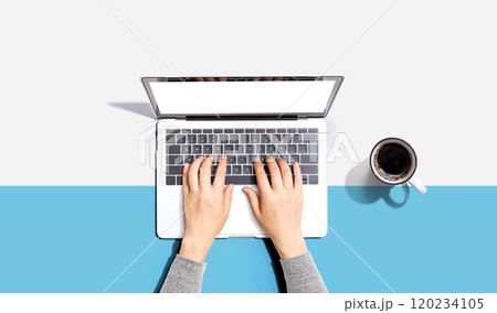 Person using a laptop computer Person using a laptop computer 120234105