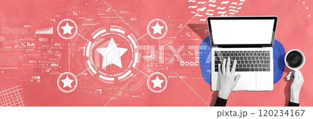 Rating star concept with person using a laptop 120234167