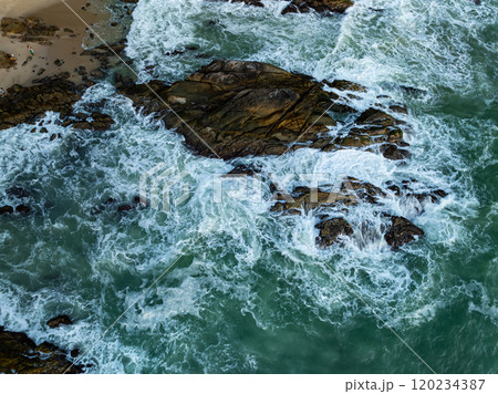 Amazing waves crashing on rocks,Beautiful sea in summer season seascape background ,Nature sea beach waves background Amazing waves crashing on rocks,Beautiful sea in summer season seascape background ,Nature sea beach waves background 120234387