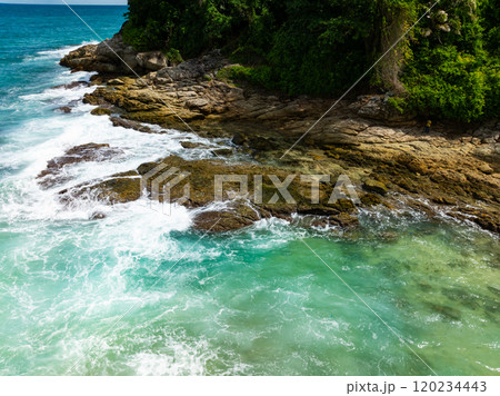 Amazing waves crashing on rocks,Beautiful sea in summer season seascape background ,Nature sea beach waves background Amazing waves crashing on rocks,Beautiful sea in summer season seascape background ,Nature sea beach waves background 120234443