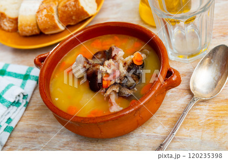 Pea soup with meat served in bowl Pea soup with meat served in bowl 120235398