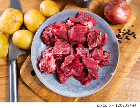 Veal cut into pieces for frying 120235444
