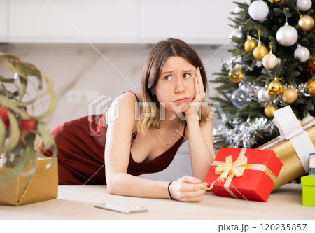 Portrait of a frustrated young woman at home Portrait of a frustrated young woman at home 120235857