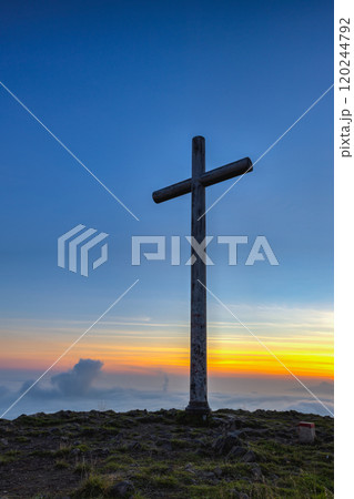 Monumental modern cross on top of Radobyl hill 120244792