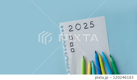 New Goals Concept. Writing Goals for the New Year 2025 During the Winter Holidays 120246183