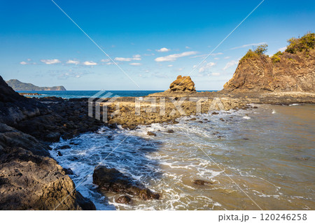 Playa Ocotal and Pacific ocean, rocky shore, El Coco Costa Rica 120246258