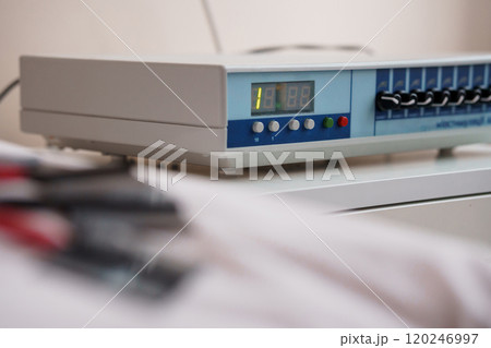 Medical Equipment with Digital Display and Control Buttons on Table 120246997