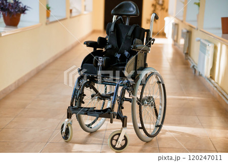 Modern Wheelchair in a Bright Corridor 120247011