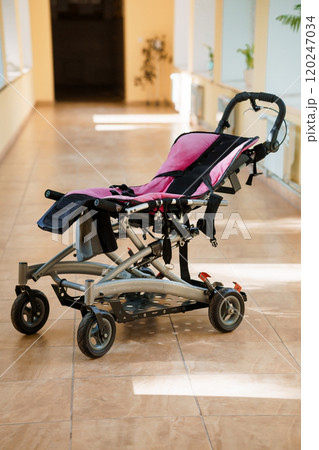 Colorful Lightweight Stroller in Bright Hallway 120247034