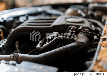 Close-Up of a Modern Automobile Engine with Intricate Components and Textures Close-Up of a Modern Automobile Engine with Intricate Components and Textures 120248081