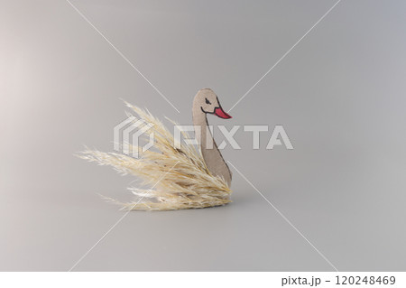 abstract bird swan made of autumn dry leaves, easy nature craft for kids, recycled empty toilet paper roll tubes, everyday materials transform into creative project abstract bird swan made of autumn dry leaves, easy nature craft for kids, recycled empty toilet paper roll tubes, everyday materials transform into creative project 120248469