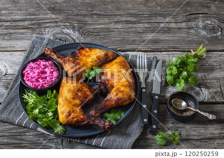 roast chicken leg quarters with a beetroot salad 120250259