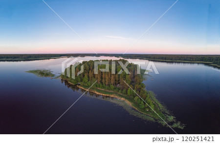 Aerial top view to island in summer evening during white nights. Vuoksa lake river and channels system leaking in Finland and Russia flowing into Ladoga. Romashki village, Leningrad region, karelia. 120251421