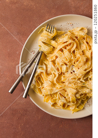 Fettuccine, tagliatelle, in creamy garlic sauce, Italian traditional cuisine, pasta carbonaro, Fettuccine, tagliatelle, in creamy garlic sauce, Italian traditional cuisine, pasta carbonaro, 120251860