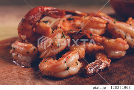 fried tiger prawns, jumbo, in garlic sauce, in butter, with herbs, on a wooden board, homemade, no people, fried tiger prawns, jumbo, in garlic sauce, in butter, with herbs, on a wooden board, homemade, no people, 120251968