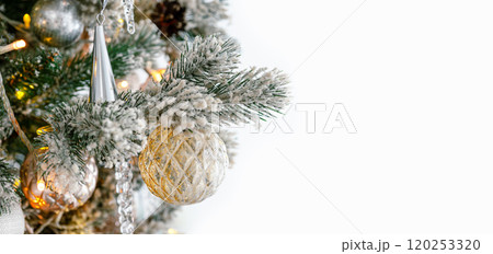 Decorated Christmas tree with frosted ornaments and warm lights isolated on white background Decorated Christmas tree with frosted ornaments and warm lights isolated on white background 120253320