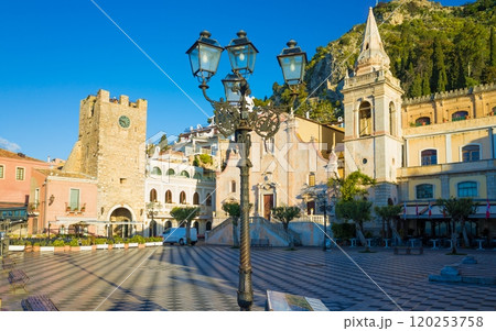 Square Piazza IX Aprile with San Giuseppe church and Clock Tower in Taormina, Sicily, Italy. Square Piazza IX Aprile with San Giuseppe church and Clock Tower in Taormina, Sicily, Italy. 120253758