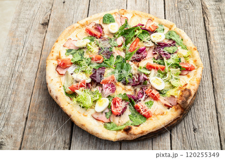 Italian pizza caesar with eggs salad chicken tomatoes and mozzarella photography. top view Italian pizza caesar with eggs salad chicken tomatoes and mozzarella photography. top view 120255349