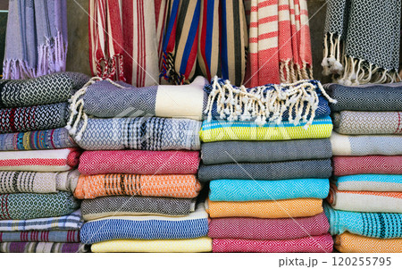 Colorful blankets and throws are displayed at market stall in Istanbul, Turkey 120255795