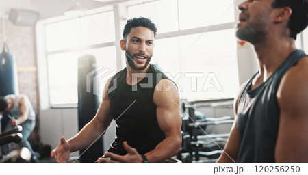 Exercise bike, fitness and motivation with men in gym together for break from cardio training or workout. Breathing, elliptical machine and sweating with personal trainer in health club for workout 120256250