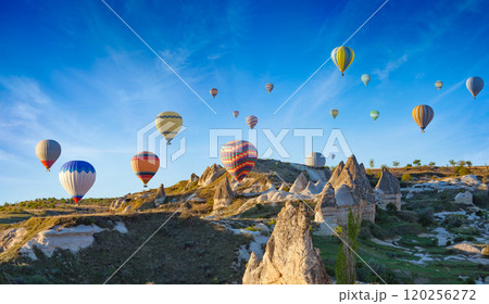 Hot air balloons at sunrise in Cappadocia, Turkey Hot air balloons at sunrise in Cappadocia, Turkey 120256272
