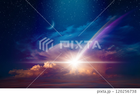 Giant colorful comet or shooting star in starry sky with glowing clouds Giant colorful comet or shooting star in starry sky with glowing clouds 120256738