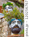 Traditional Testa di Moro planter on Taormina balcony 120256767