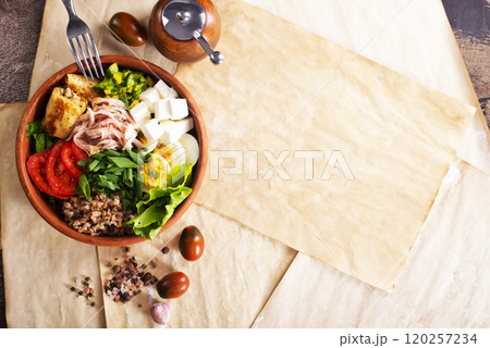 Delicious healthy breakfasts, buckwheat with boiled egg and meat and cheese Delicious healthy breakfasts, buckwheat with boiled egg and meat and cheese 120257234