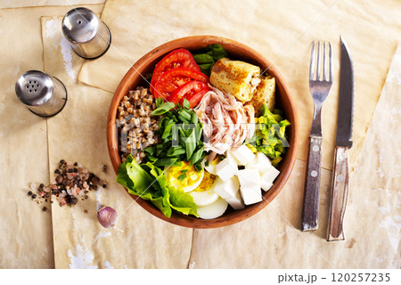 Delicious healthy breakfasts, buckwheat with boiled egg and meat and cheese Delicious healthy breakfasts, buckwheat with boiled egg and meat and cheese 120257235