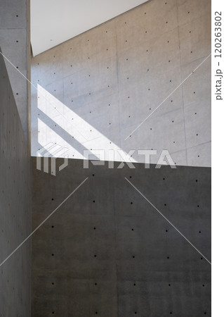 Abstract, minimalist, modern architectural space with concrete walls and curved element Abstract, minimalist, modern architectural space with concrete walls and curved element 120263802