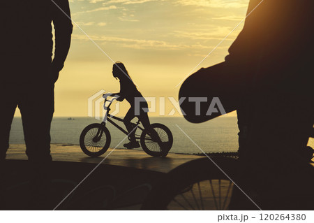 Skateboarding and BMX bike Silhouette Extreme Skatepark Images Orange Sunlight Youth Culture Enjoy Sports Vacation Skateboard Skateboarding and BMX bike Silhouette Extreme Skatepark Images Orange Sunlight Youth Culture Enjoy Sports Vacation Skateboard 120264380