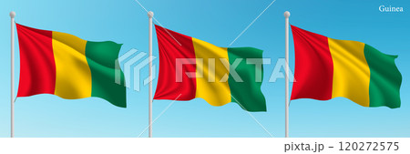 Set of three flags of Guinea waving on flagpoles 120272575