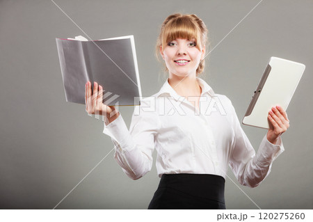 Woman learning with ebook and book. Education. Woman learning with ebook and book. Education. 120275260