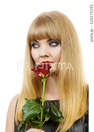 Woman gorgeous girl dark makeup holds rose flower Woman gorgeous girl dark makeup holds rose flower 120275295