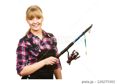 Similing woman wearing check shirt holding fishing rod Similing woman wearing check shirt holding fishing rod 120275301