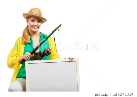 Happy woman with fishing rod holding board 120275314