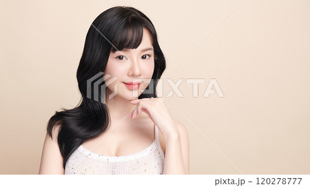 Beautiful young asian woman with clean fresh skin on beige background, Face care, Facial treatment, Cosmetology, beauty and spa, Asian women portrait. 120278777