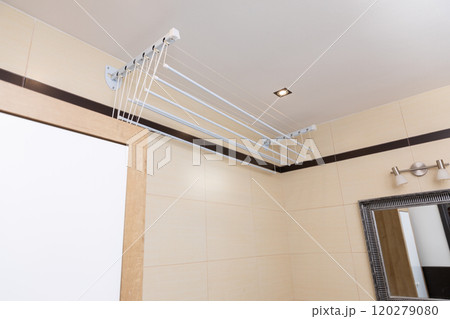 The Innovative Ceiling Drying Rack for Bathrooms combines functionality and aesthetics seamlessly The Innovative Ceiling Drying Rack for Bathrooms combines functionality and aesthetics seamlessly 120279080