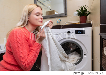 Fresh Laundry Delight Embracing and Enjoying the Inviting Scent of Clean Linens 120279174